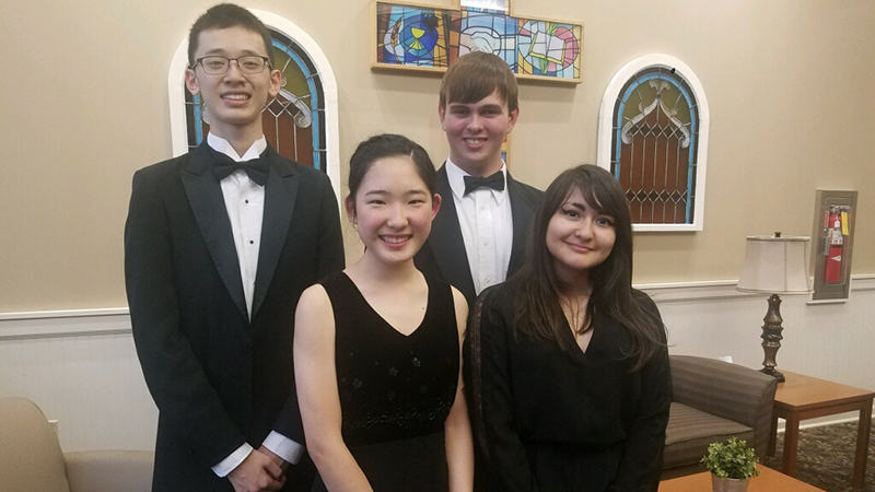 From-left-to-right_-Ethan-Zheng,-Emi-Kawamura,-Shane-Reed,-and-Gabi-Gazette From left to right: Ethan Zheng, Emi Kawamura, Shane Reed, and Gabi Gazette.