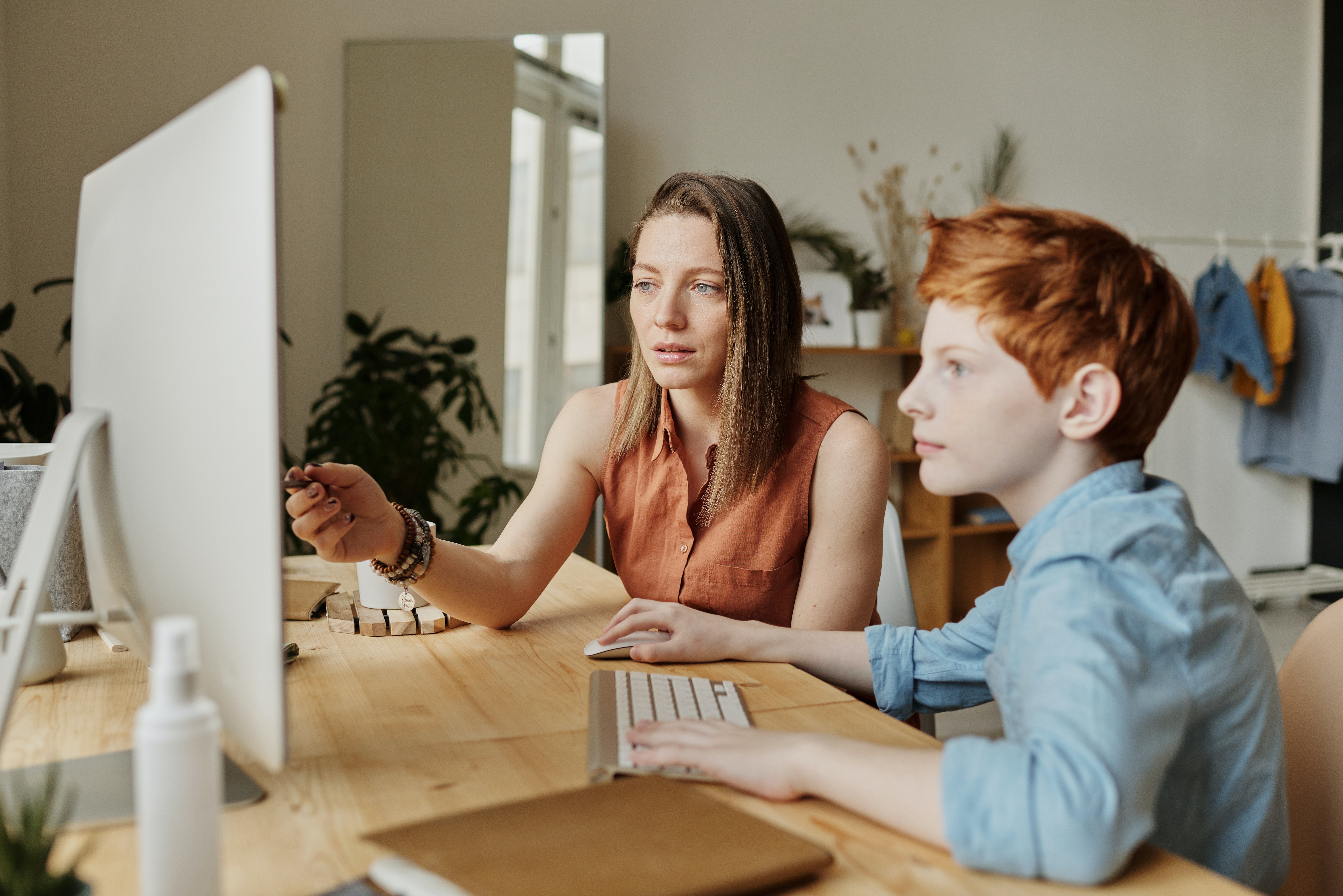 photo-of-woman-teaching-his-son-4145354 (1)